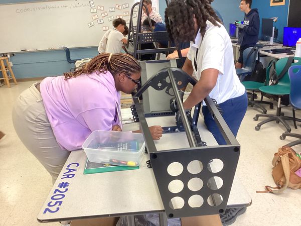Raven Racing students building car #2052, photo 3 of 14