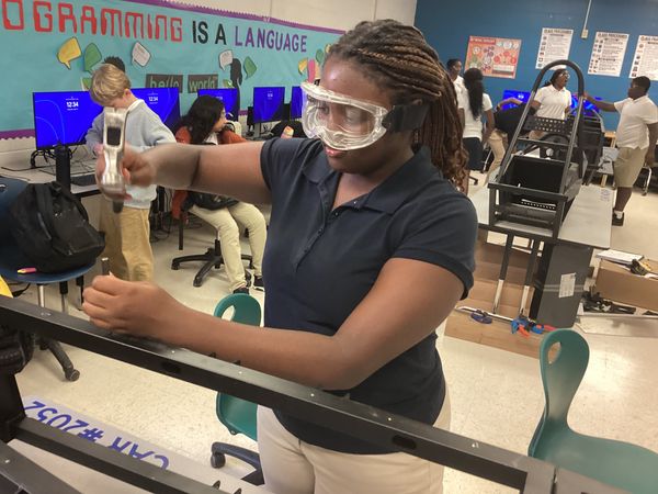 Raven Racing students building car #2052, photo 5 of 14